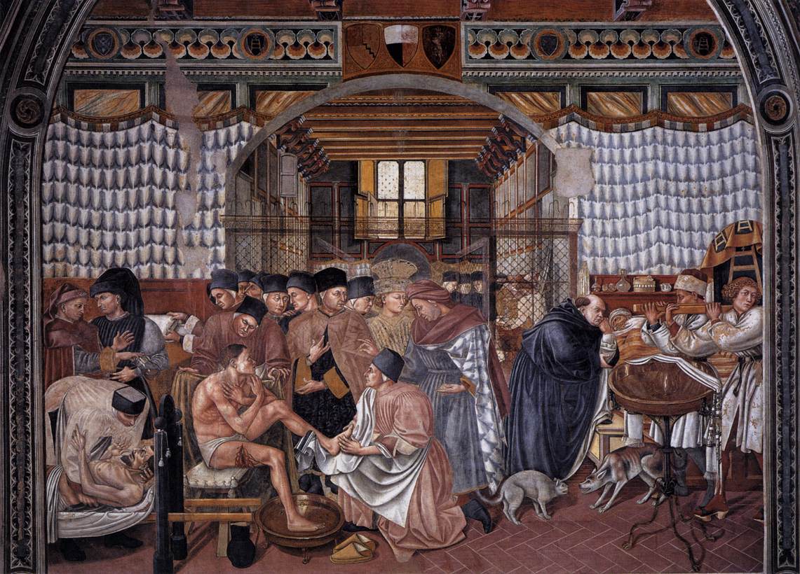 Fresque d'une salle d'hôpital du XVe siècle : un malade assis se fait laver les pieds, entouré de médecins, de frères et de visiteurs, tandis qu'un chat et un chien se font face au premier plan