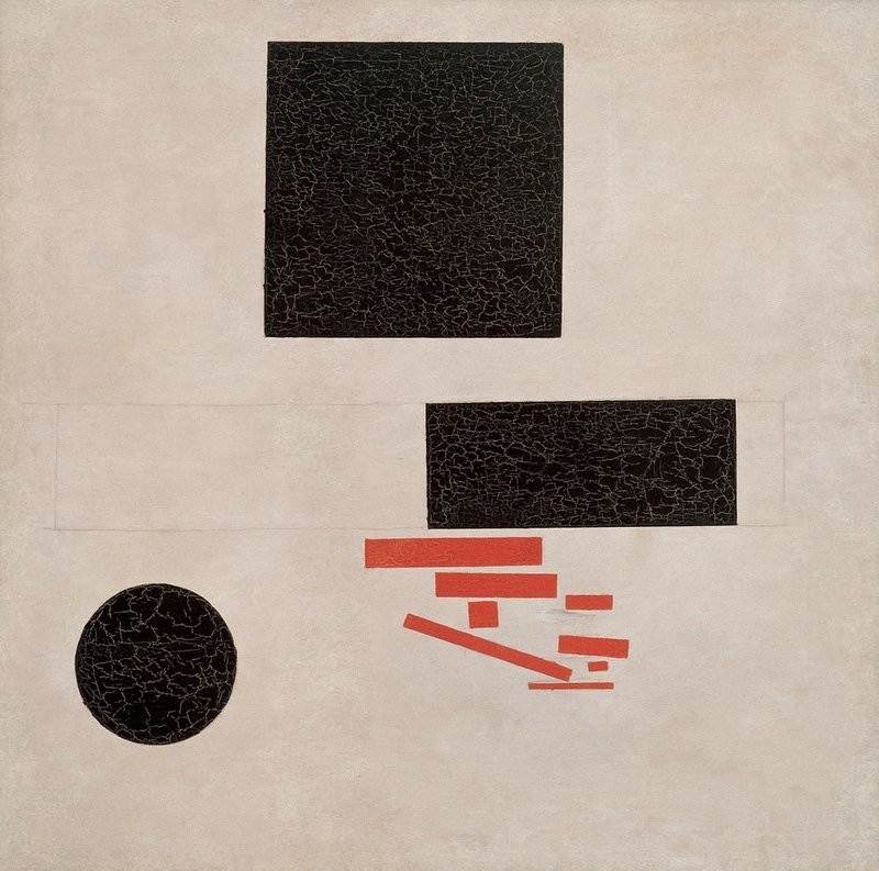 Sur fond clair, un carré noir, un rectangle noir, un disque noir et quelques barres rouges