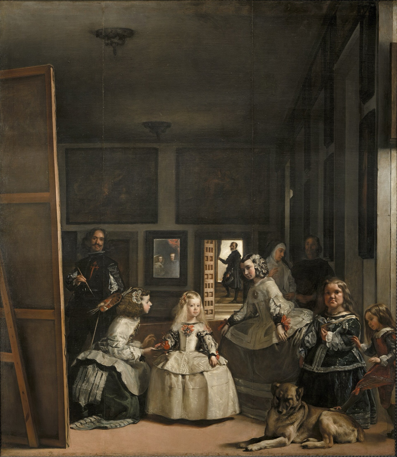 Dans une vaste salle du palais, l'infante entourée de ses demoiselles d'honneur, d'une naine et d'un chien ; à gauche, le peintre devant une grande toile dont on ne voit que le revers